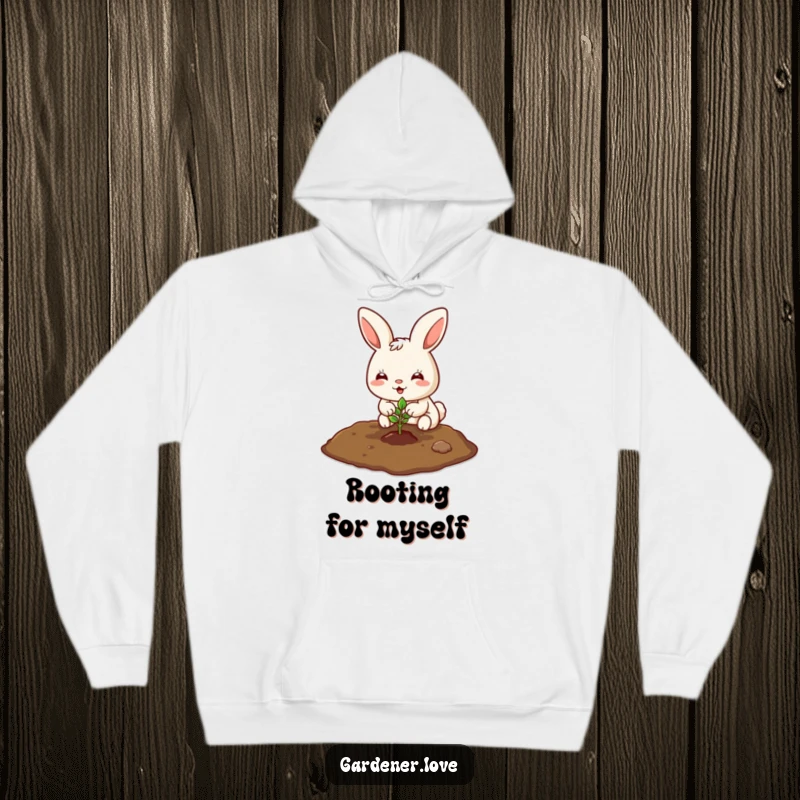 Funny Kawaii bunny planting a tiny seedling in the soil, cozy hoodie for gardeners.