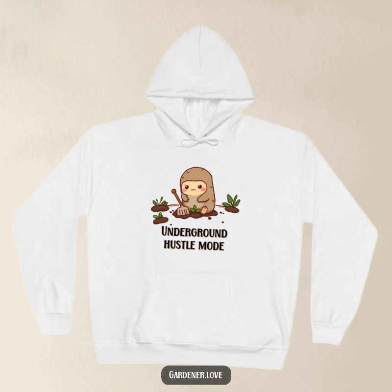 Funny hoodie featuring a busy Kawaii mole character enthusiastically digging a small garden bed, exuding dedication and charm.